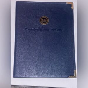 Penn State binder paper holder.